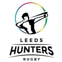 "Leeds Hunters Rugby" logo with a player throwing a ball inside a rainbow-coloured ring.