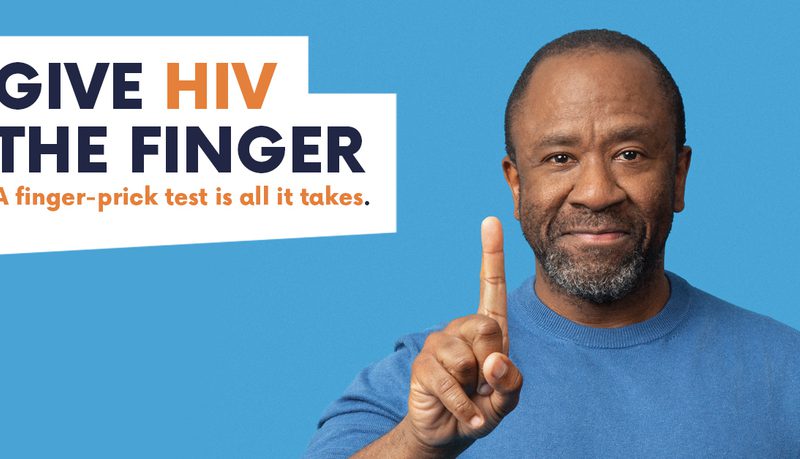 "Give HIV the Finger - a finger-prick test is all it takes" banner with a person holding up one finger.