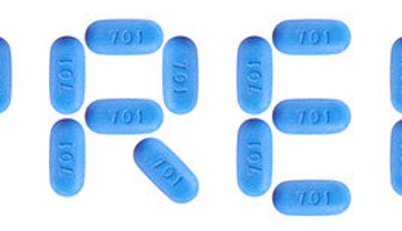 Blue PrEP pills arranged to spell the word "PREP" on a white background.